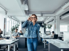 The Case For Investing In Your Career At Every Salary Level young woman in office